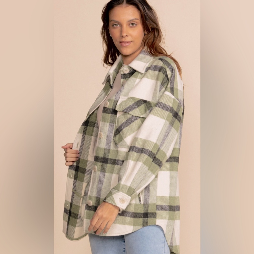 Women’s oversized plaid button down jacket. Size XS fits like a Med.